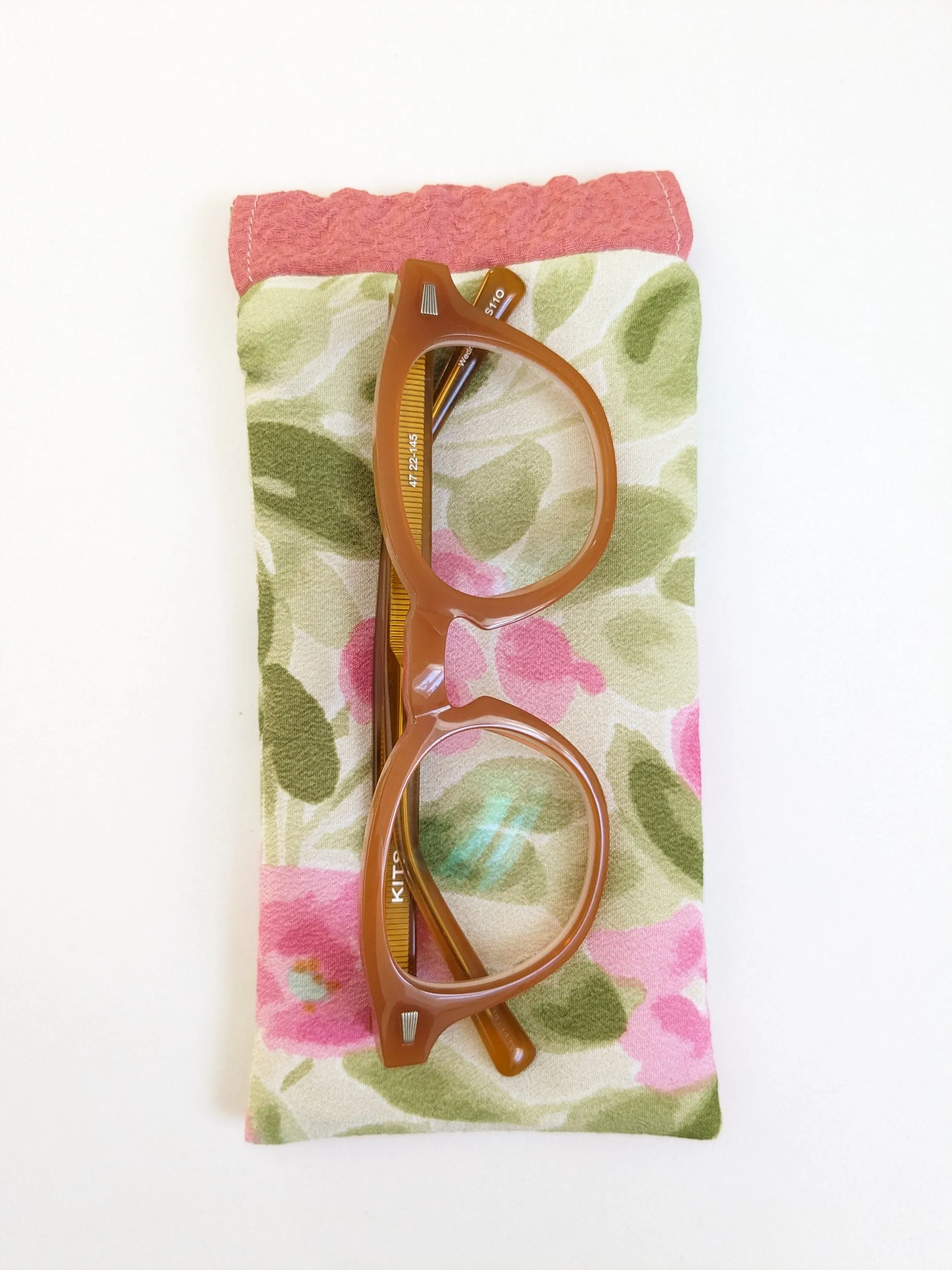 Green and pink flowers glasses case