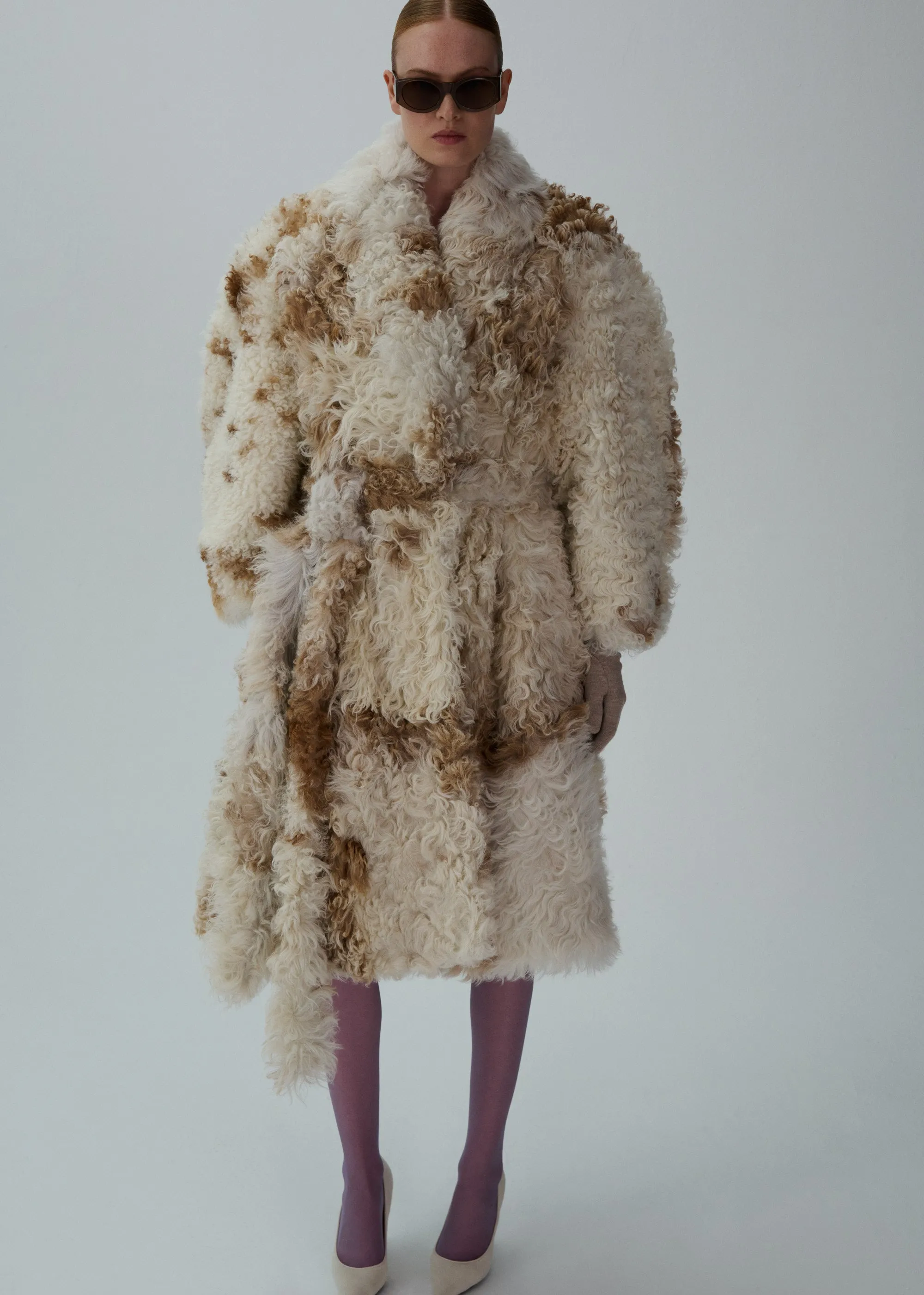 Shaggy shearling coat in white and caramel